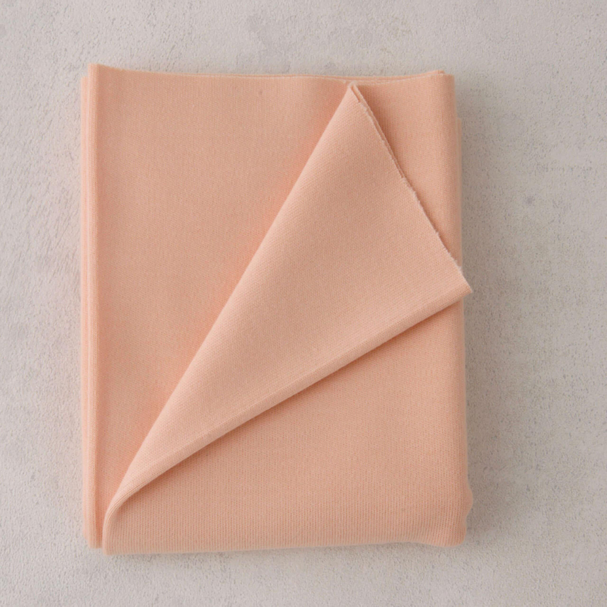 T102 Doll Jersey, 25x80 cm verpakt, Zalm