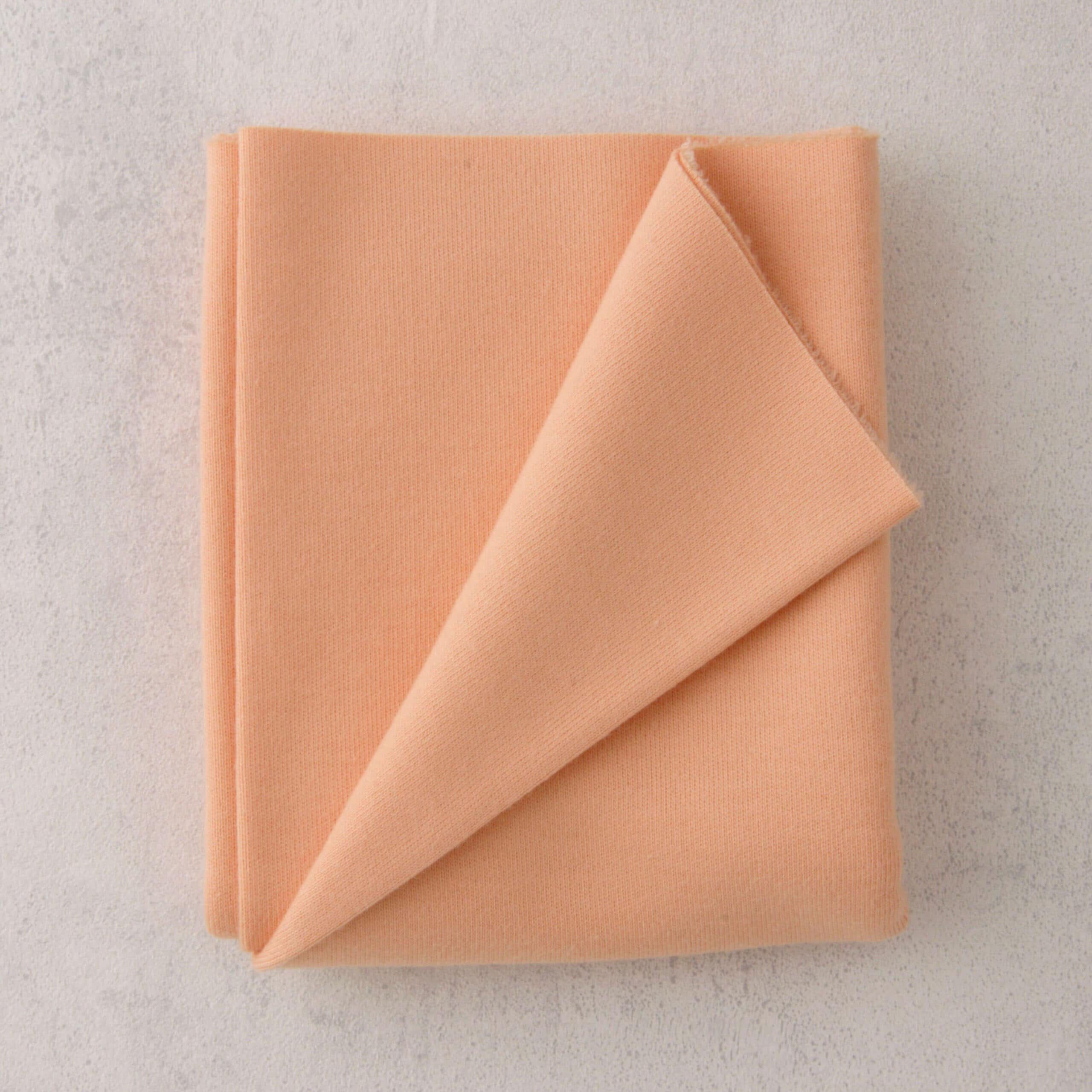 T103 Doll Jersey, 25x80 cm verpakt, Perzik